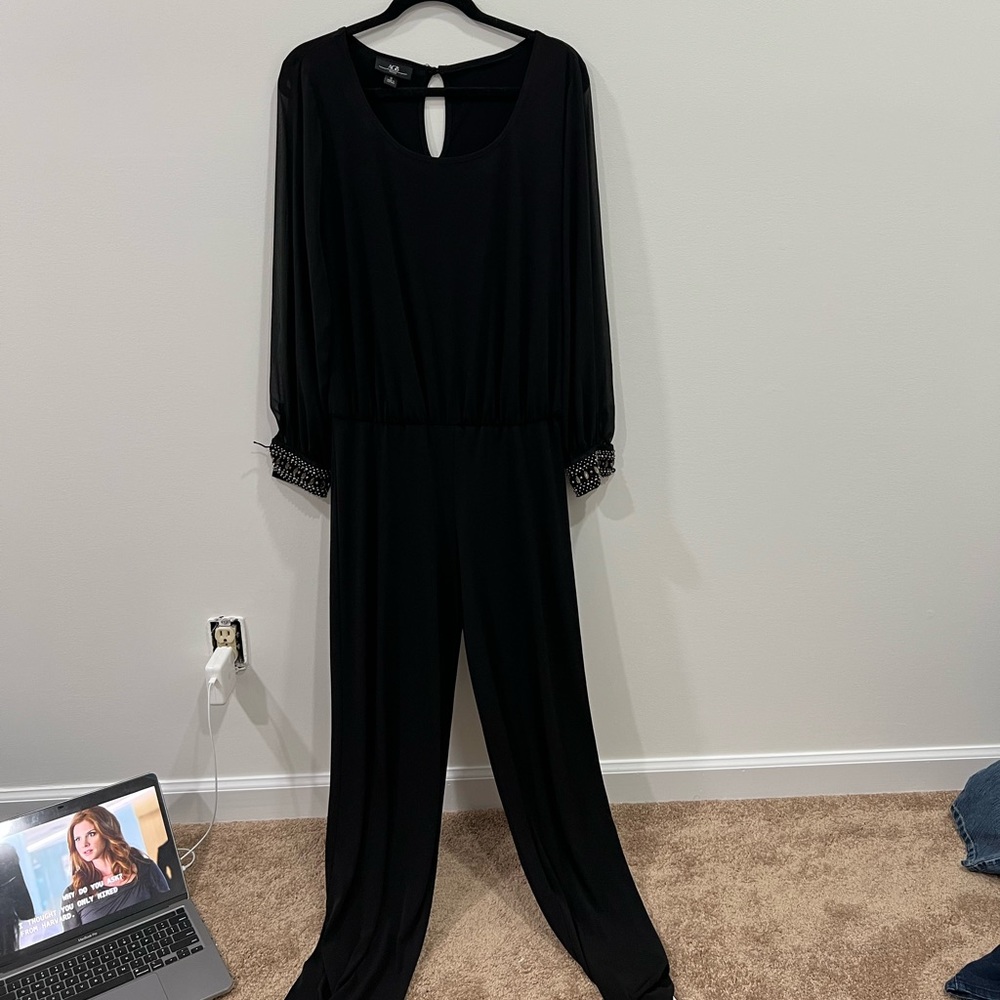 SHEER JUMPSUIT WITH GEMS ON THE SLEEVES